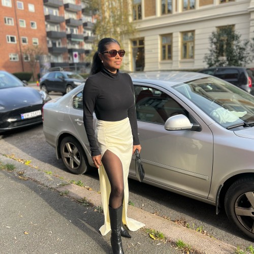 Naomi X.